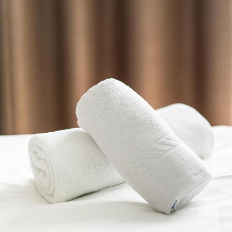 Postel nebo postele na pokoji v ubytování Hotel Garni Planaces