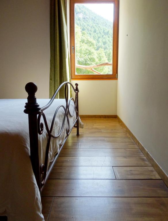 Postel nebo postele na pokoji v ubytování Mas de Pau - Boutique Apartments