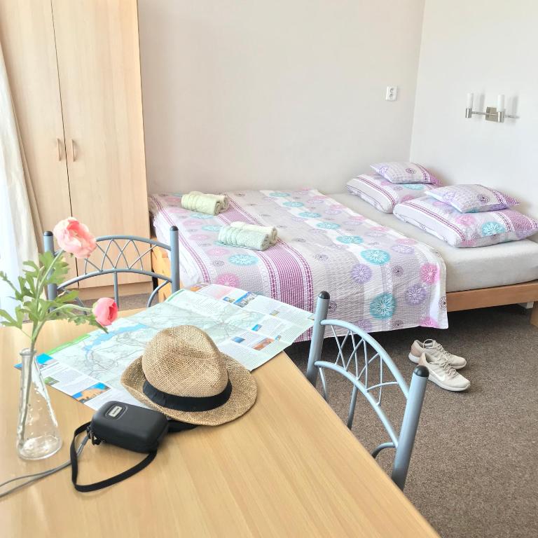 Postel nebo postele na pokoji v ubytování Pension Crhan