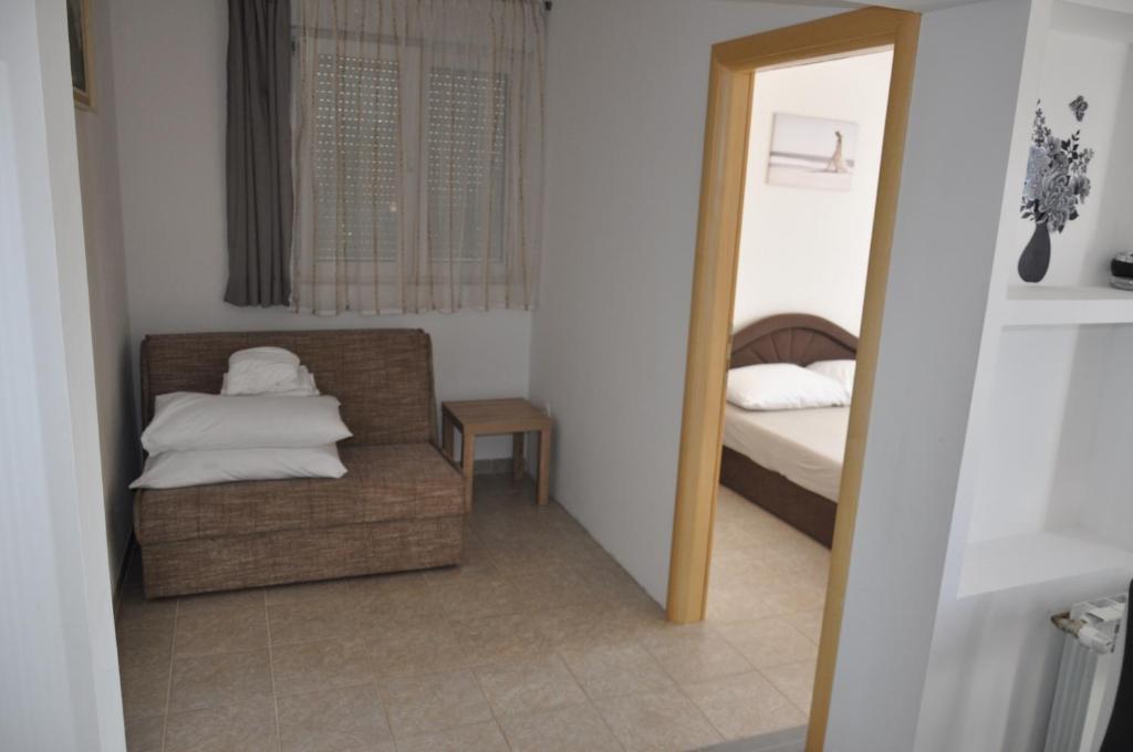Posteľ alebo postele v izbe v ubytovaní Batinic Apartmani