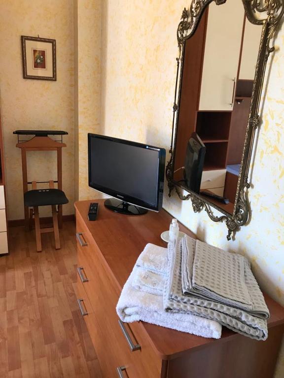 TV a/nebo společenská místnost v ubytování Mirella's House ViaVerona