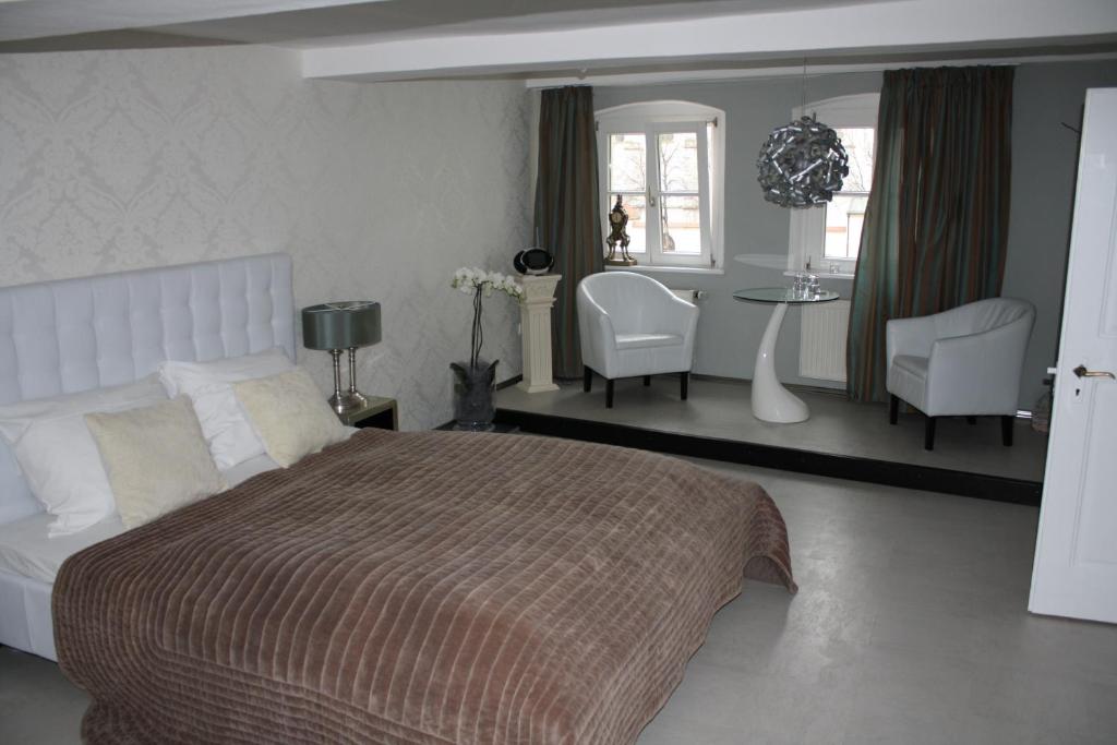 Postel nebo postele na pokoji v ubytování Elements Hotel