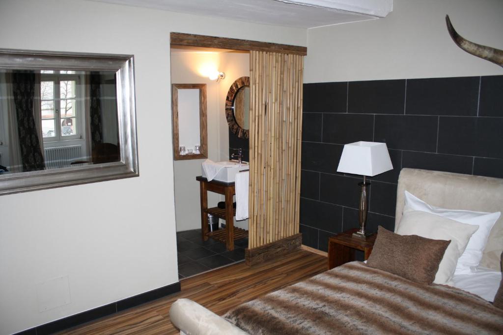 Postel nebo postele na pokoji v ubytování Elements Hotel