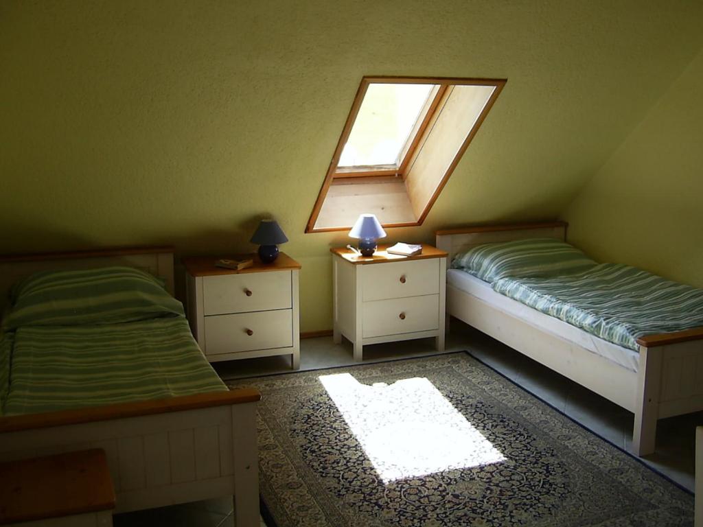 Postel nebo postele na pokoji v ubytování Penzion Rozalie
