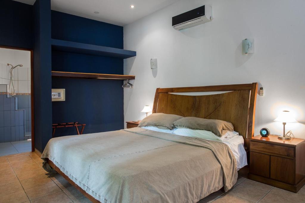 Postel nebo postele na pokoji v ubytování Villas Macondo