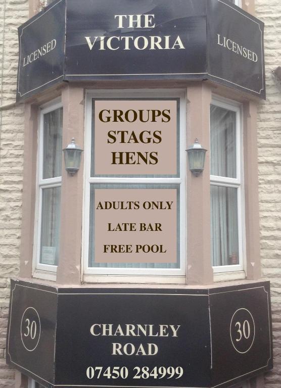 a sign on the side of a building at Victoria Hotel Blackpool in Blackpool
