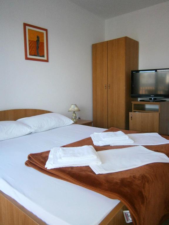 Postel nebo postele na pokoji v ubytování Guest House Babić