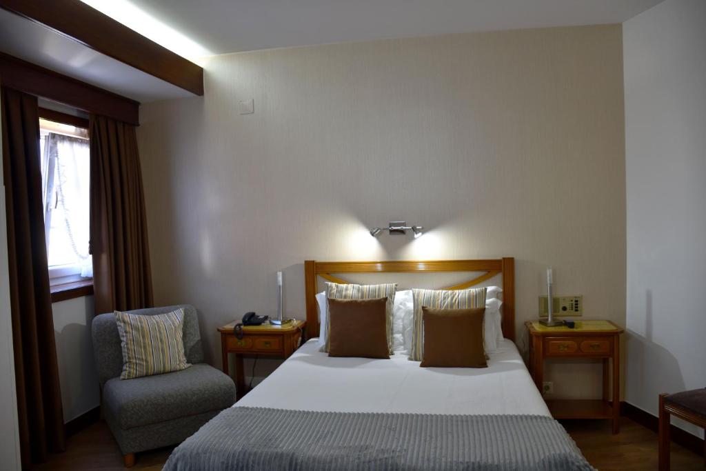 Postel nebo postele na pokoji v ubytování Hotel Dona Sofia