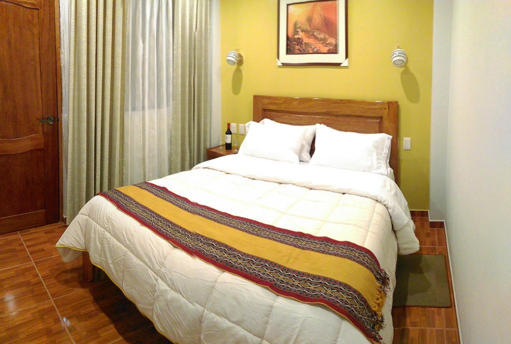 Postel nebo postele na pokoji v ubytování Picos House MachuPicchu