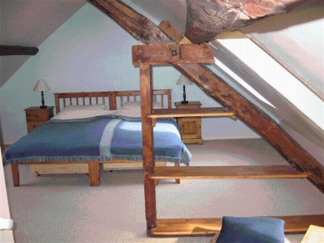 Postel nebo postele na pokoji v ubytování Papilio