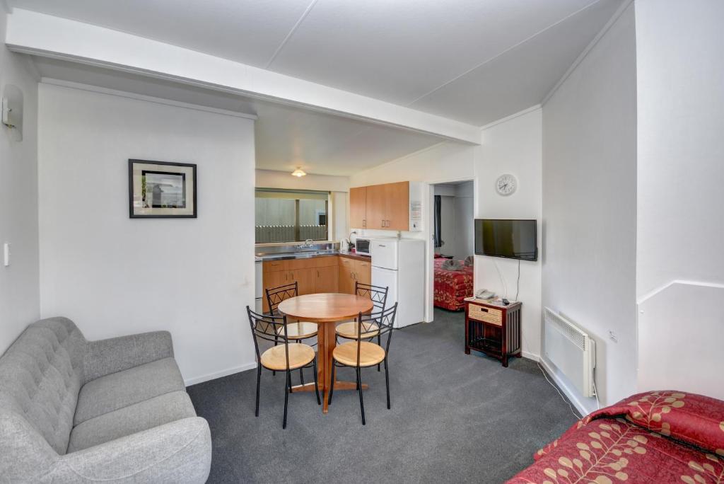 Kuchyň nebo kuchyňský kout v ubytování Garden Motel
