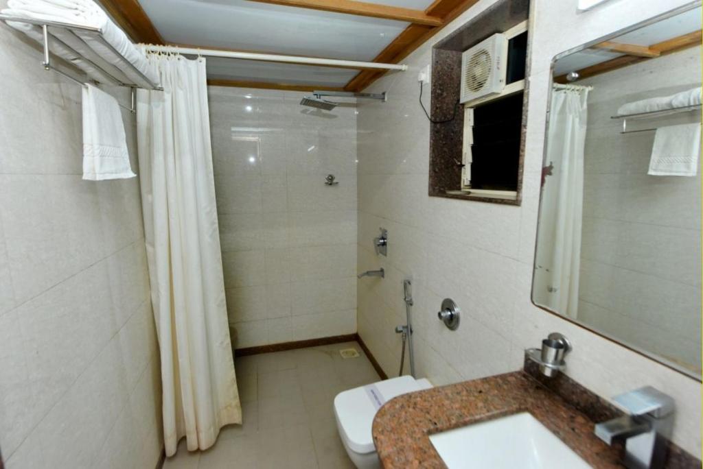 Koupelna v ubytování Boshan Hotels
