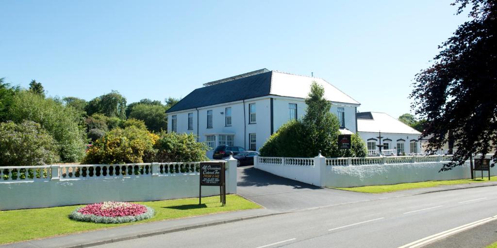 a building on the side of a road at Hotel Plas Hyfryd in Narberth