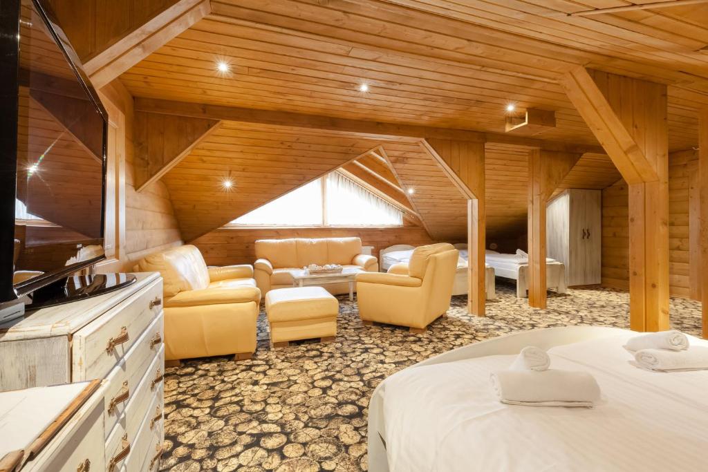 Posezení v ubytování Wellness Cottage CEDER