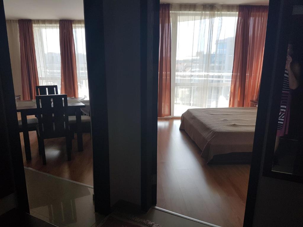 Postel nebo postele na pokoji v ubytování Tatyana Apartment