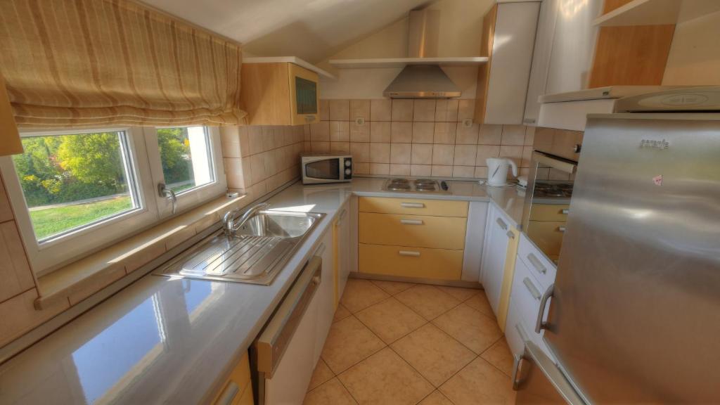 Kuchyňa alebo kuchynka v ubytovaní Apartment Villa Molina