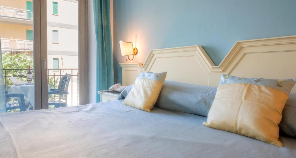 Postel nebo postele na pokoji v ubytování Hotel Ascot Sorrento