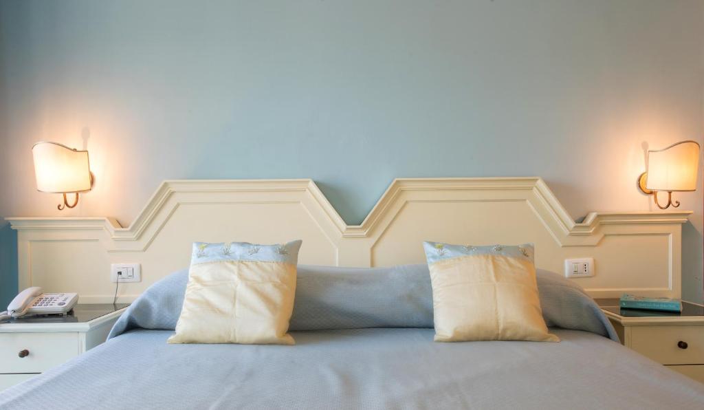 Postel nebo postele na pokoji v ubytování Hotel Ascot Sorrento