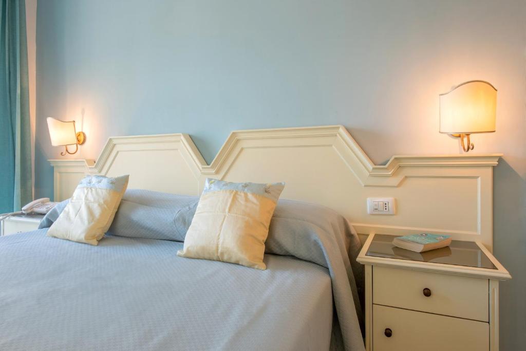 Postel nebo postele na pokoji v ubytování Hotel Ascot Sorrento