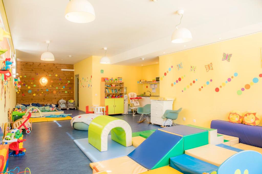 a room with many different colored play equipment at Martinhal Sagres Beach Family Resort Hotel in Sagres