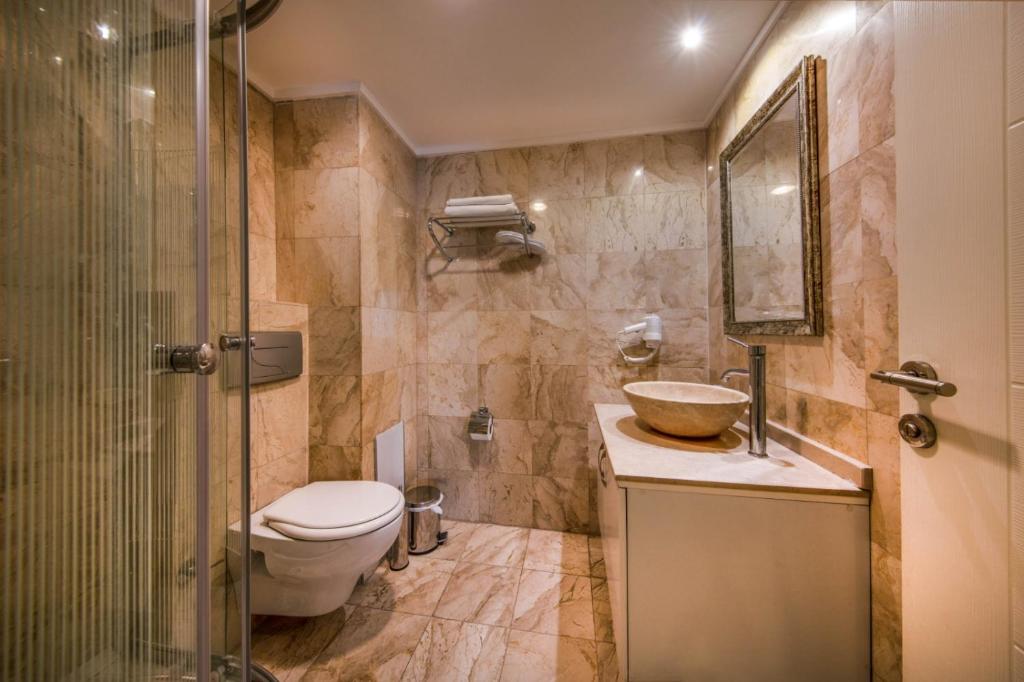 Koupelna v ubytování Asia Business Suites