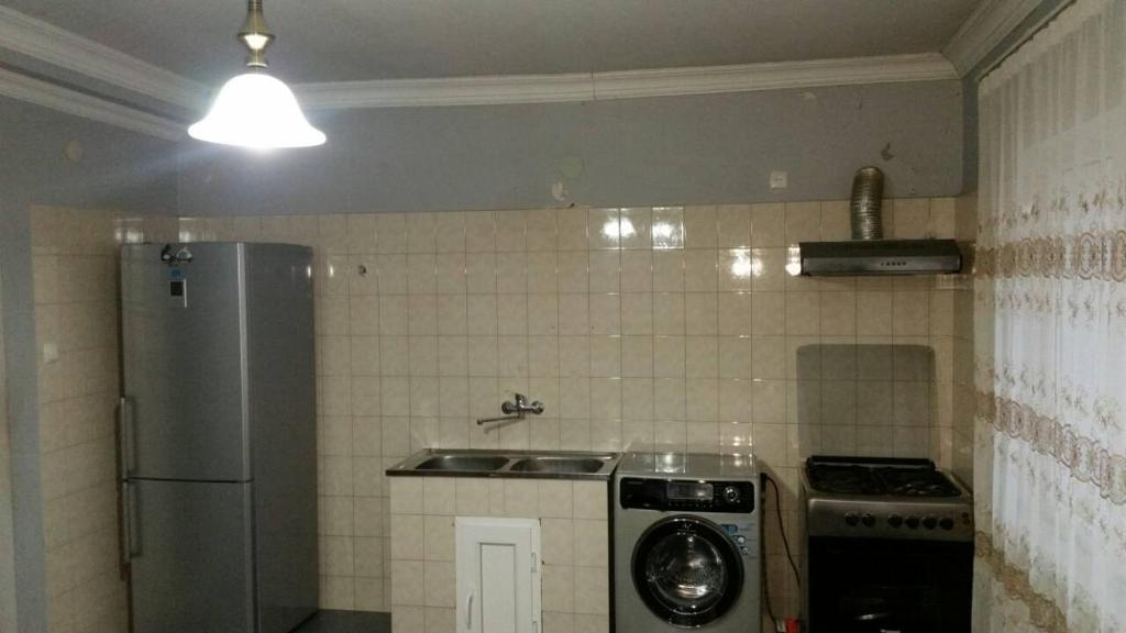 Kuchyň nebo kuchyňský kout v ubytování Hotel Ergo