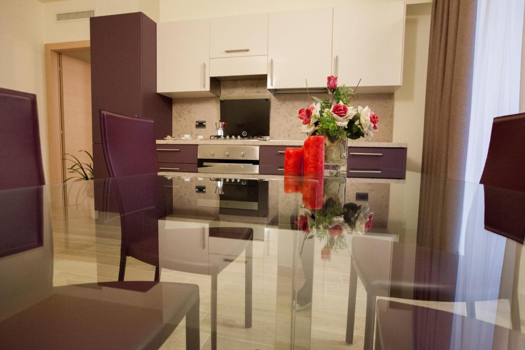 Kuchyň nebo kuchyňský kout v ubytování Residenza Agnello D'Oro