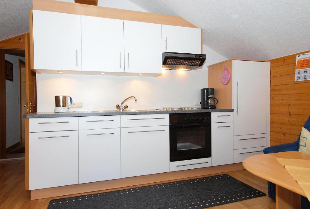 A kitchen or kitchenette at Ferienbauernhof Moosbrugger