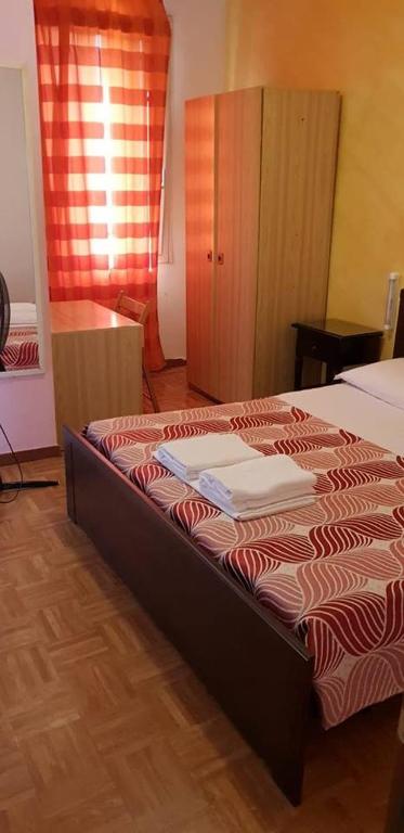 Postel nebo postele na pokoji v ubytování Hotel Giovannina