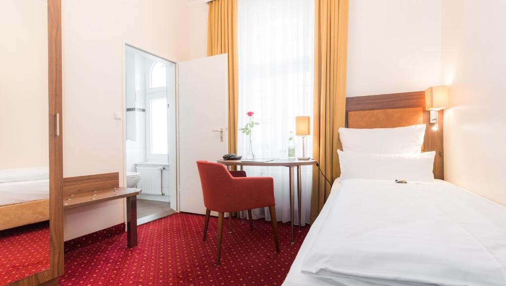 Cama o camas de una habitación en Hotel Fürst Bismarck