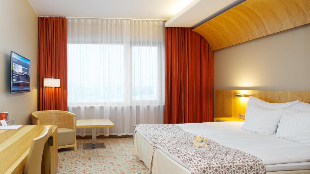 Katil atau katil-katil dalam bilik di Hestia Hotel Europa