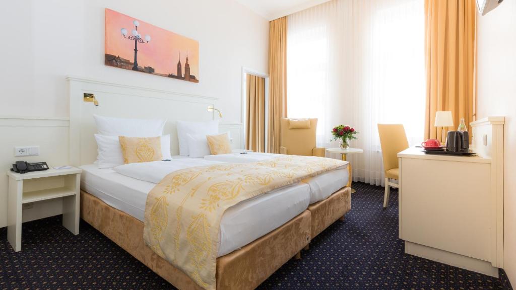 Cama o camas de una habitación en Hotel Fürst Bismarck