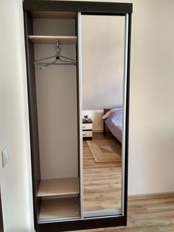 Postel nebo postele na pokoji v ubytování Грушевського 13