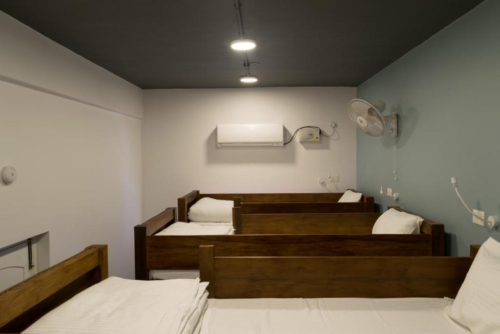 Postel nebo postele na pokoji v ubytování Micasa Hostels