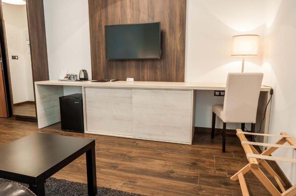 Kuchyň nebo kuchyňský kout v ubytování Hotel U Kašny