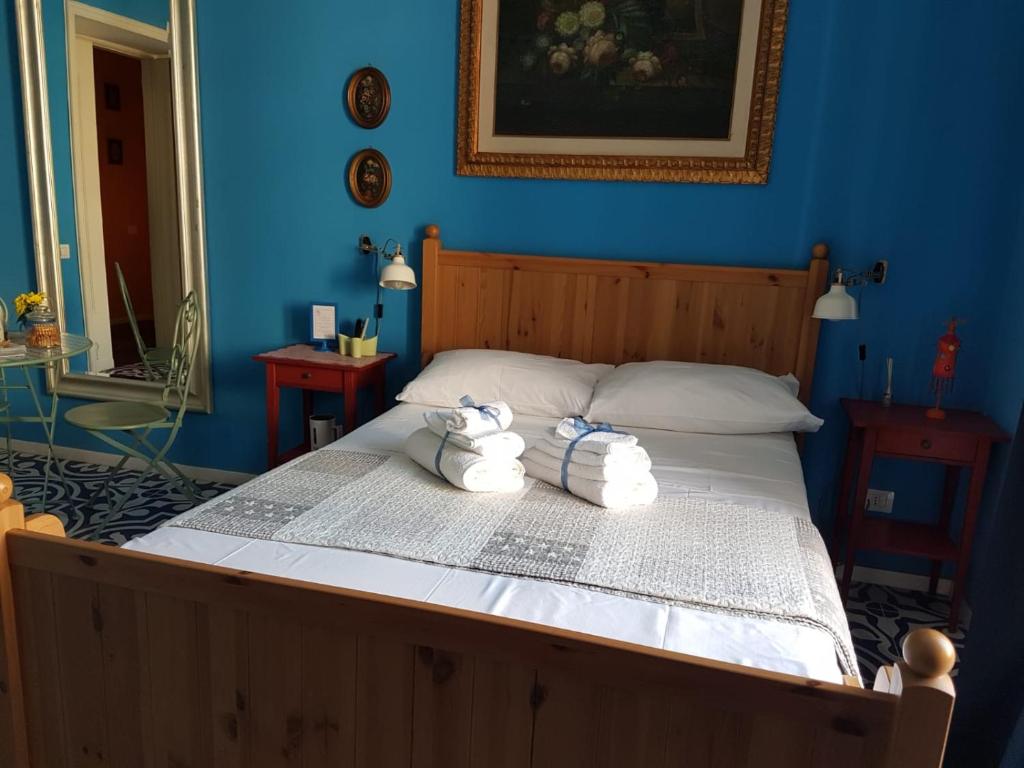 Una cama o camas en una habitación de B&B Villa Italia