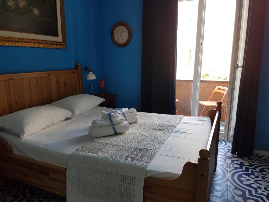 Una cama o camas en una habitación de B&B Villa Italia