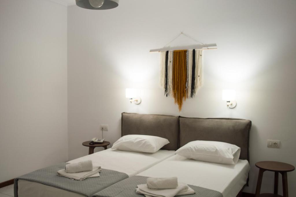 Postel nebo postele na pokoji v ubytování Paradise Beach Hotel