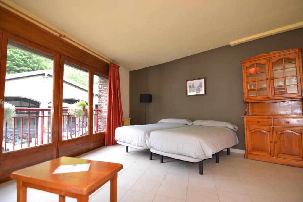 Postel nebo postele na pokoji v ubytování Apartamentos Turisticos Poblado