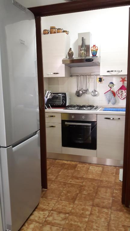 Kuchyň nebo kuchyňský kout v ubytování Villetta sul mare in residence