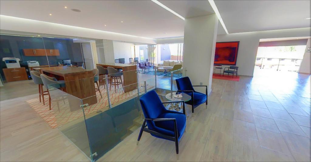 Posezení v ubytování NEhotel Nueva Estancia