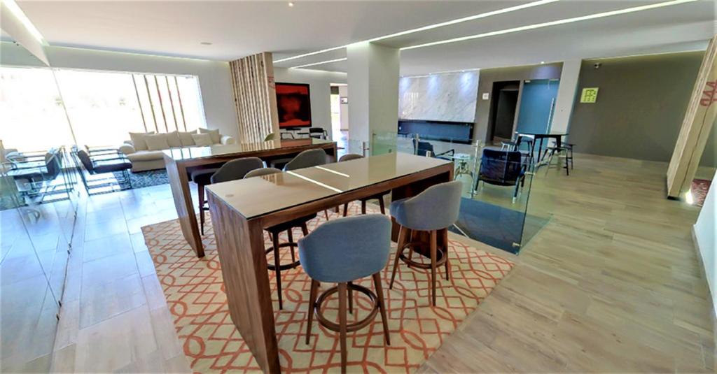 TV a/nebo společenská místnost v ubytování NEhotel Nueva Estancia