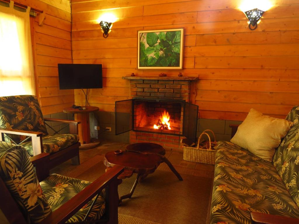 TV a/nebo společenská místnost v ubytování Rancho Amalia