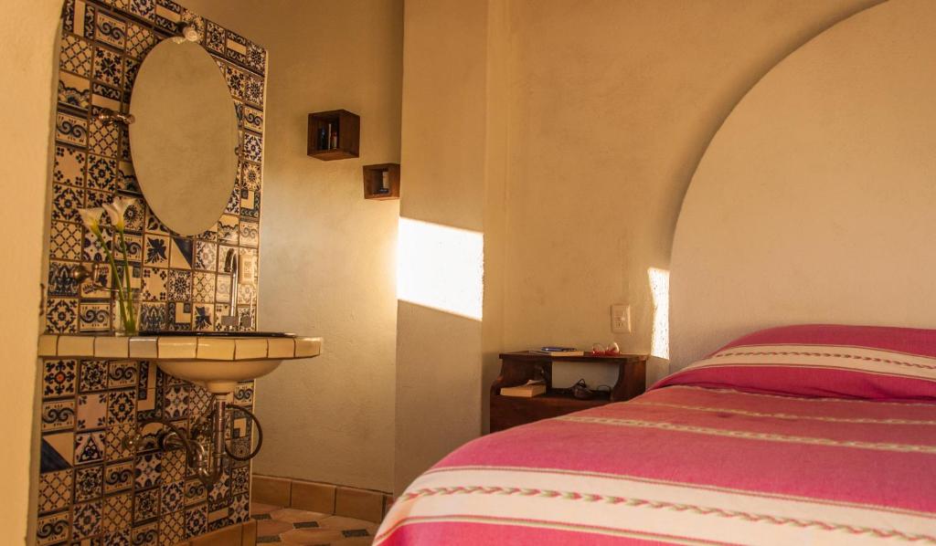 Postel nebo postele na pokoji v ubytování HEVEN Residence