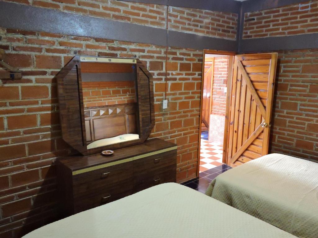Postel nebo postele na pokoji v ubytování Cabañas- Casas España