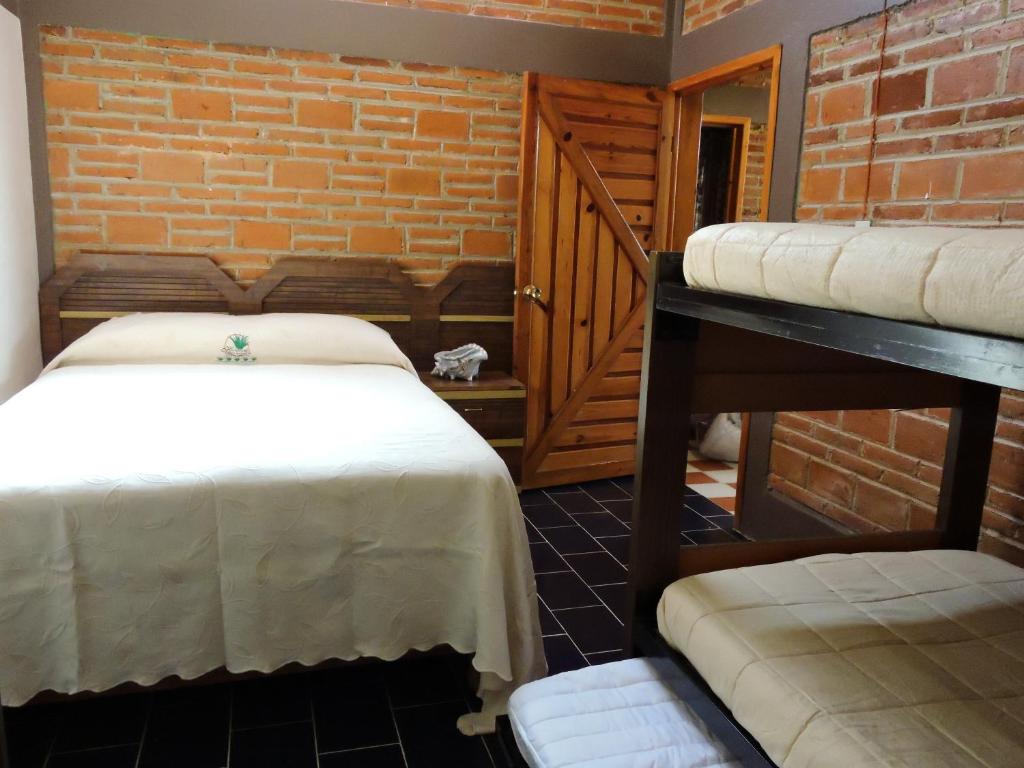 Postel nebo postele na pokoji v ubytování Cabañas- Casas España