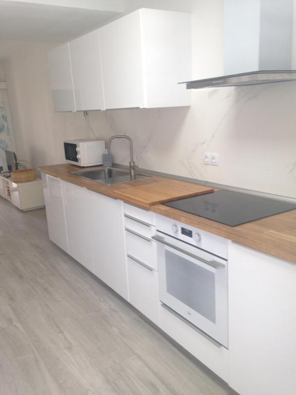 Kuchyň nebo kuchyňský kout v ubytování Bungalow Playa del Inglés centre