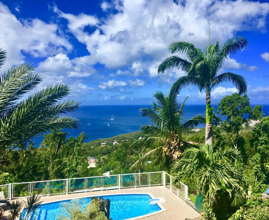 a view of the ocean from a villa at Villa Rose Caraibes in Pointe-Noire