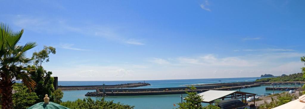 a view of a body of water with a marina at Sansendai Sea View B&amp;B in Chenggong