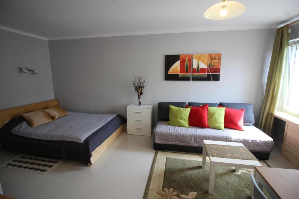 Posteľ alebo postele v izbe v ubytovaní Apartament pod Jasną Górą